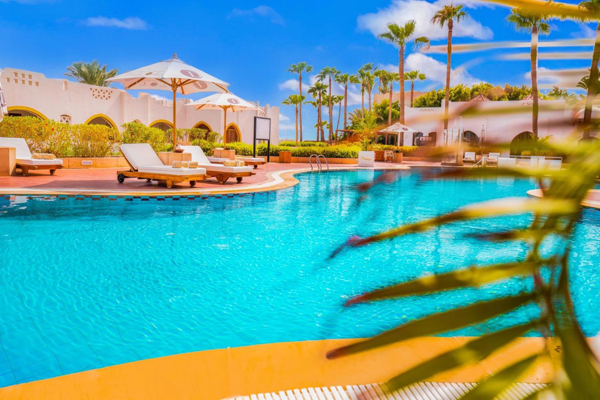 Domina Coral Bay Resort, Diving , Spa & Casino Sharm el-Sheikh Exterior photo The swimming pool at the resort