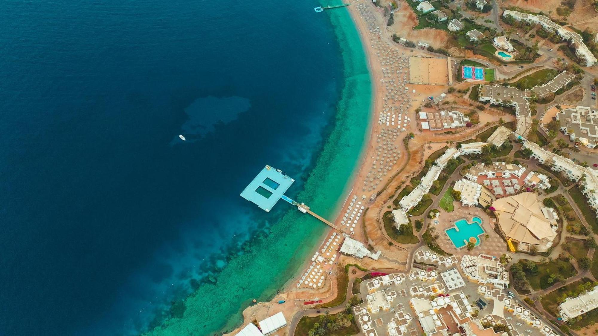 Domina Coral Bay Resort, Diving , Spa & Casino Sharm el-Sheikh Exterior photo Aerial view of the bay