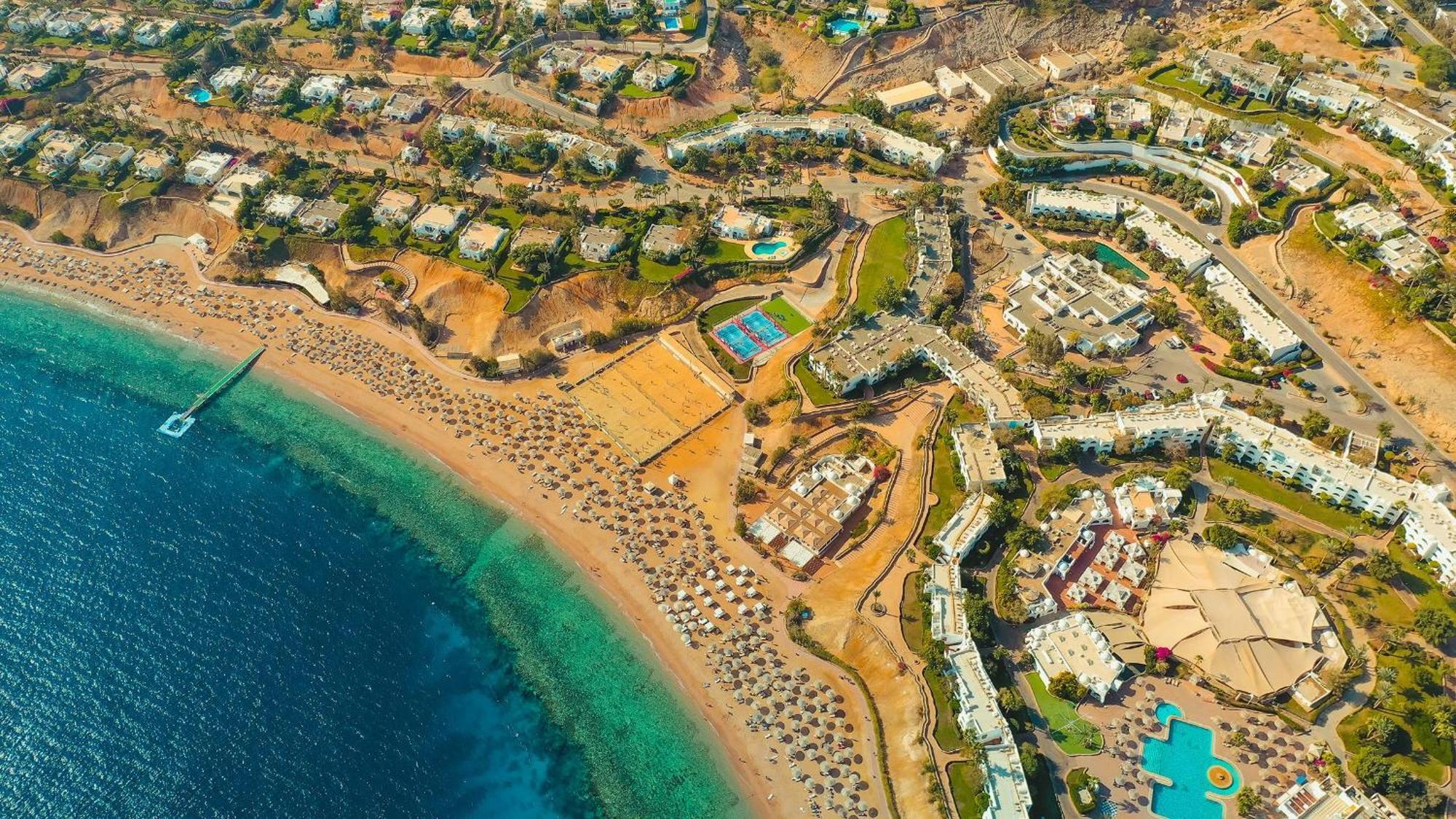 Domina Coral Bay Resort, Diving , Spa & Casino Sharm el-Sheikh Exterior photo Aerial view of the bay